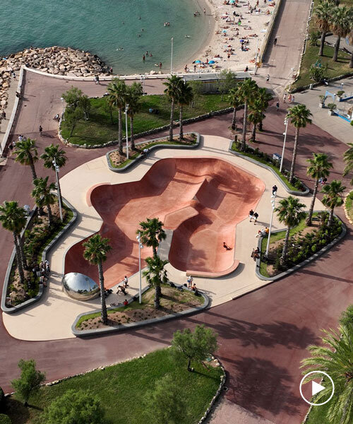 red ochre-tinted concrete coats skatepark bowl by constructo in cannes